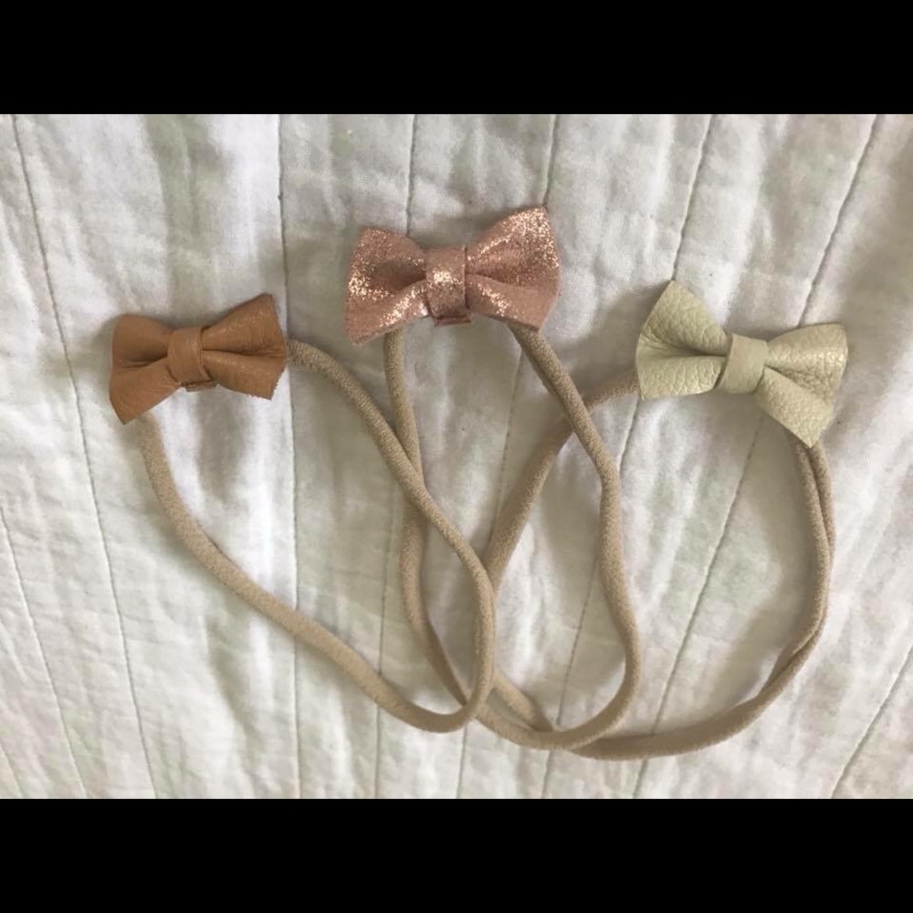 Three petite leather headbows